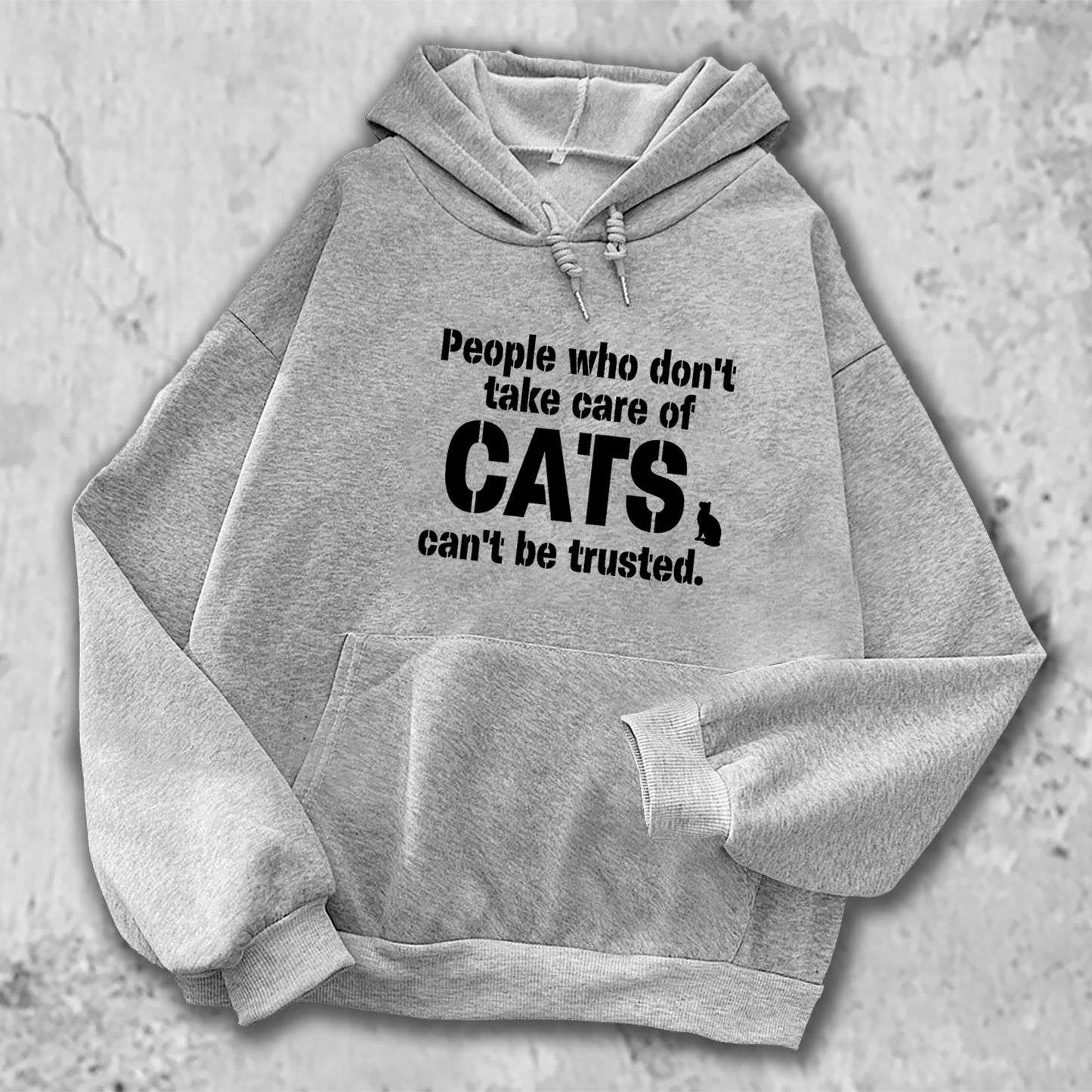 「猫を大事に扱わない人を私は信用しない。」がプリントされたパーカー  グレー