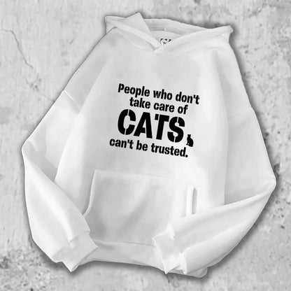 「猫を大事に扱わない人を私は信用しない。」がプリントされたパーカー  ホワイト